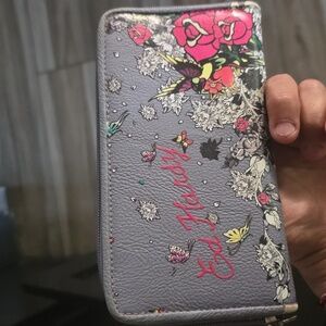 Ed Hardy never used zip around wallet
